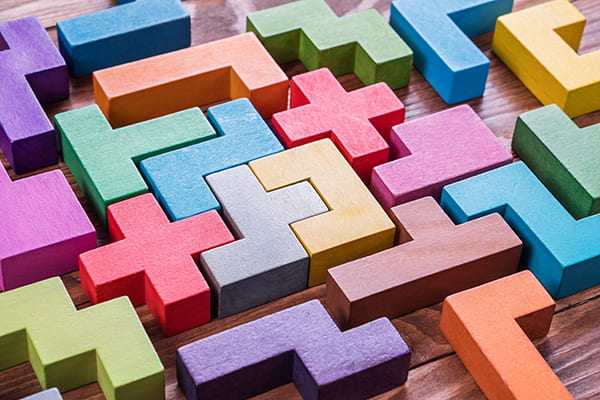 colorful tetris-like building blocks fitting together